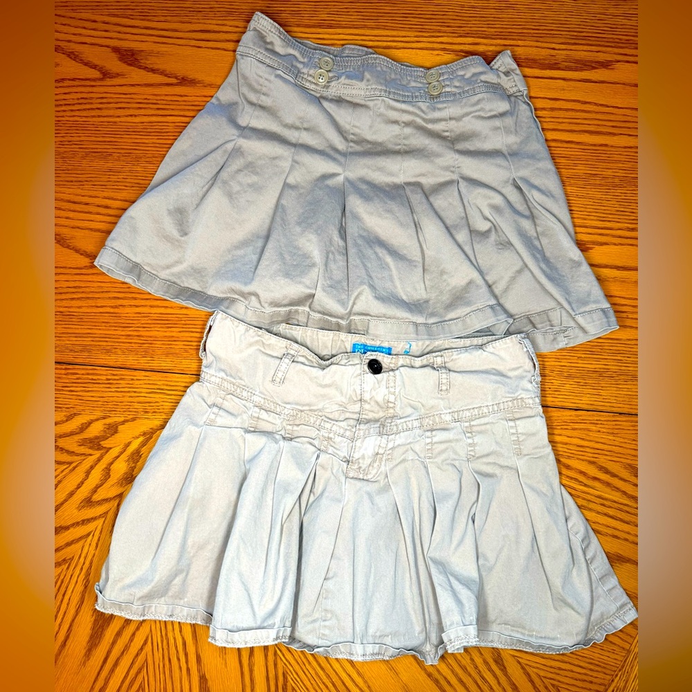 Uniform skirts. 2 pair size 14, khaki, with built in shorts.